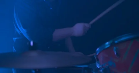 Man Playing Drums from the Side in Slow-Motion Stock Footage 98906517