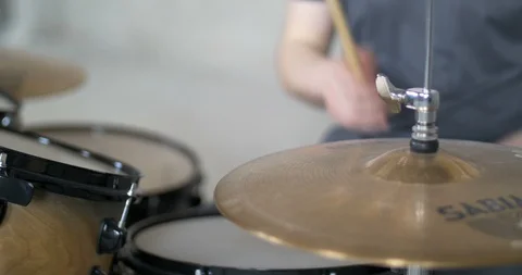 Man Playing the Drumset with blurred hands Stock Footage 104430135