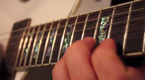 Man playing an electric guitar Stock Footage 41534779