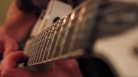 Man playing an electric guitar Stock Footage 41534820