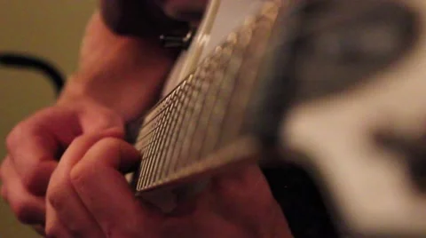 Man playing an electric guitar Stock Footage 41534824