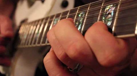Man playing an electric guitar Stock Footage 41534928
