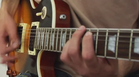 Man playing electric guitar Stock Footage 50882261