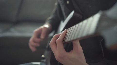 Man Playing on an Electric Guitar Stock Footage