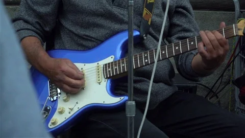 Man playing an electric guitar Stock Footage 125172009