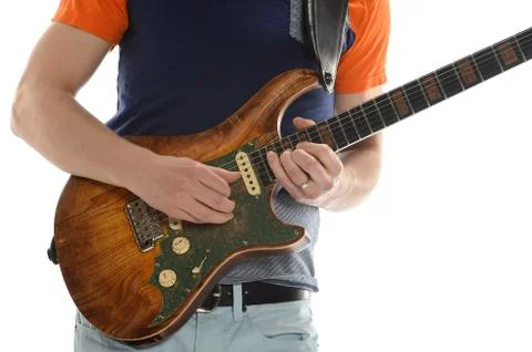 Man playing electric guitar Stock Photos