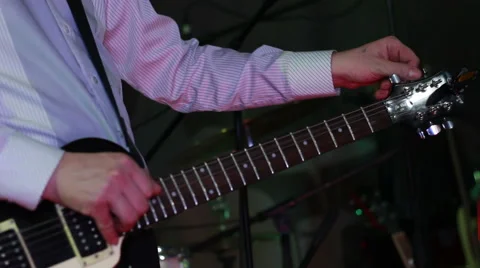 Man playing electric guitar in pub Stock Footage 58165020
