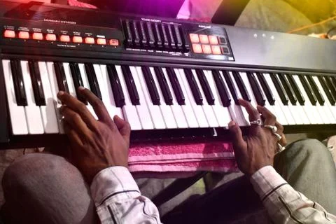 A man playing electronics piano 写真素材