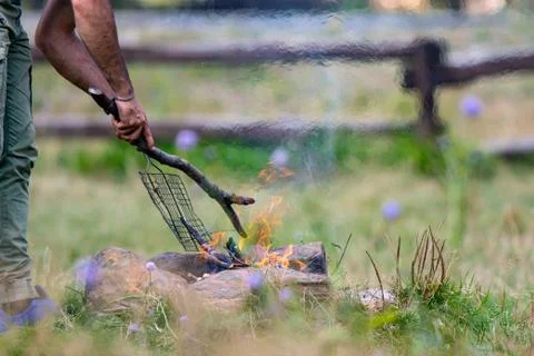 Man playing with fire Stock Photos