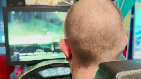 Man playing a flight simulator, immersive gaming experience, pilot simulation Stock Footage 307773042