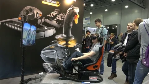 Man playing flight simulator video game with Thrustmaster flight simulation Stock Footage 81001896