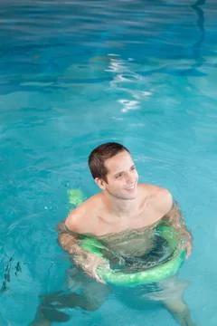 Man playing with float 스톡 사진