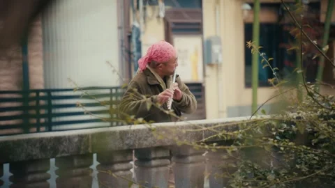 Man Playing Flute on Bridge, Itokawa River, Atami, Japan Video stock 345006455