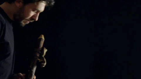 Man playing the flute Stock Footage 99956432