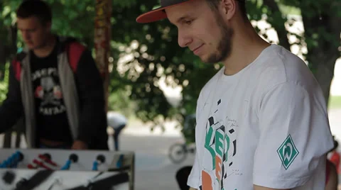 Man playing foosball Stock Footage 35240351