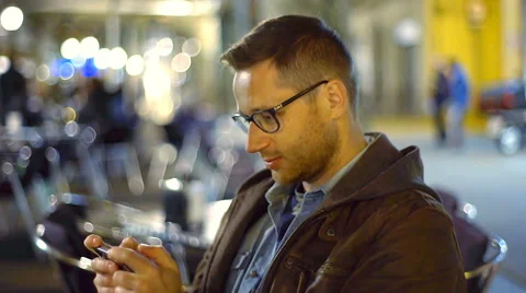 Man playing game and winning it in the cafe, steadycam shot Stock Footage 62880448