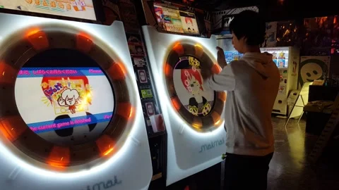 Man playing game at arcade in Nara Stock Footage 135175157