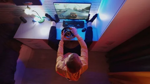 Man is playing game on computer at home. Stock Footage 125894679