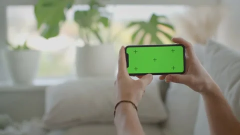 Man playing game on iphone, mockup, green screen 库存影片 218466951