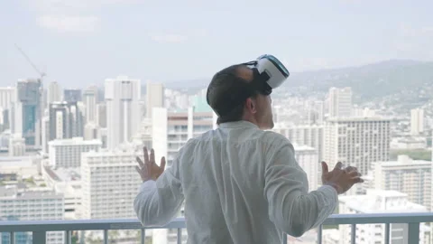 Man playing game in virtual reality glasses in Honolulu in 4k slow motion Stock Footage 90993138
