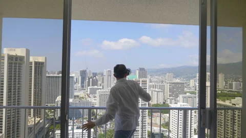 Man playing game in virtual reality glasses in Honolulu in 4k slow motion Stock Footage 90994217