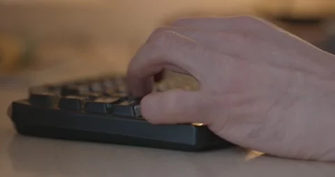 Man is Playing Games on Computer. 4K 10-bit Stock Footage 321320429