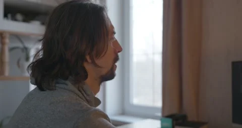 Man is Playing Games on Computer. 4K 10-bit Stock Footage 321320462