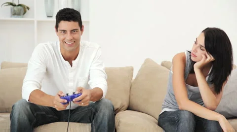 Man Playing Games Console Man While  Ignoring His Wife Stock Footage 912387