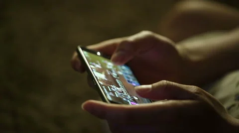 Man playing games in a dark space. Stock Footage 51709352