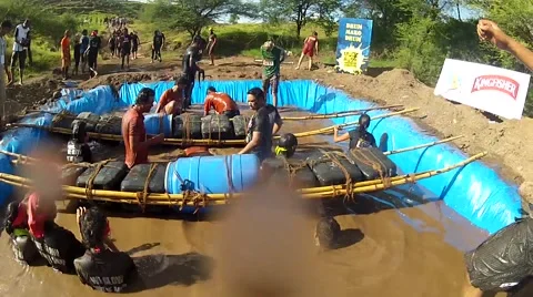 Man playing Games in Mud 動画素材 55439084