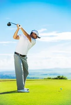Man playing golf Stock-Fotos