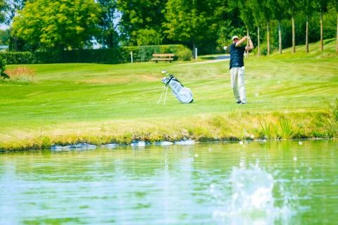 Man Playing Golf Photos