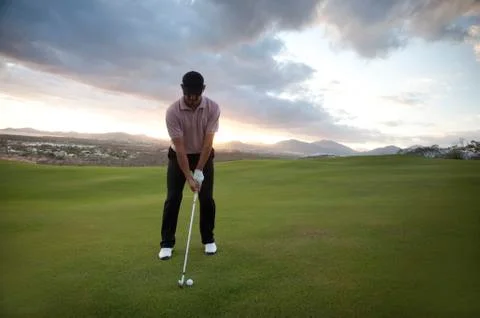 Man playing golf. Stock Photos