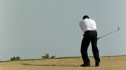 Man playing golf in slow motion Stock Footage 81194240