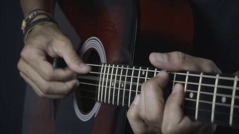 Man playing guitar on black background. Six strings. Playing with fingers Video stock 79038985