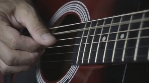 Man playing guitar on black background. Six strings. Playing with fingers Video stock 79041890