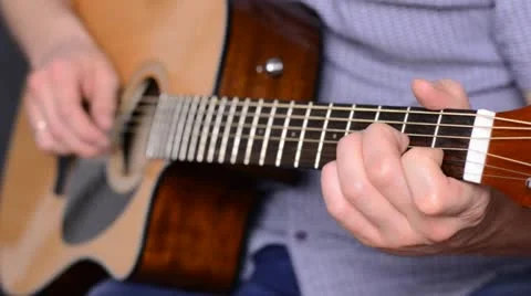 Man playing guitar close up Stock Footage 22009872