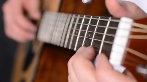 Man playing guitar close up Stock Footage 22009887