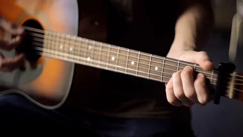 Man playing guitar close up Stock Footage 70053581