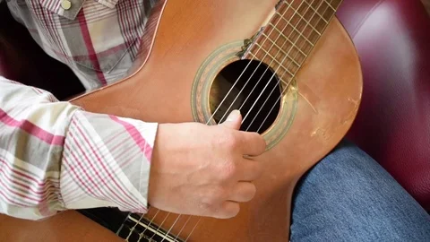 Man playing guitar close up Stock Footage 72767230