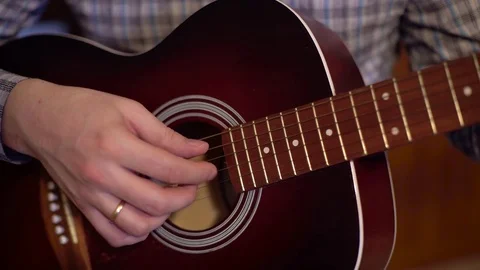 Man playing the guitar close-up Stock Footage 73752078