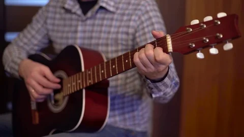 Man playing the guitar close-up Stock Footage 73752093