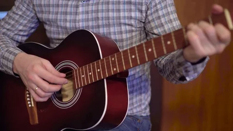 Man  playing the guitar close-up Stock Footage 73752098