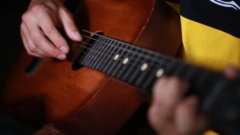 A man playing the guitar. Close up Stock Footage 92658763