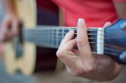 Man playing guitar , close up Stock Photos