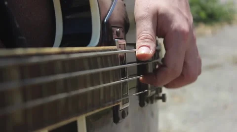 Man Playing the guitar. Closeup Stock Footage 49508329