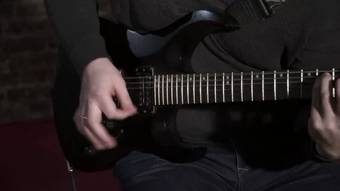 Man playing the guitar closeup Stock Footage 74199336