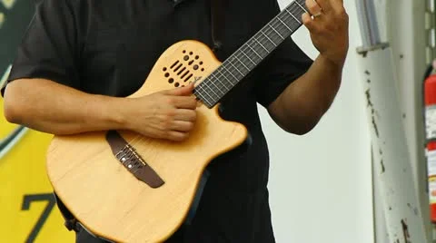 Man playing the guitar Stock Footage 11859483