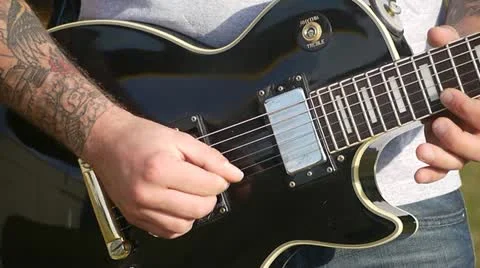 MAN PLAYING GUITAR Stock Footage 12110820