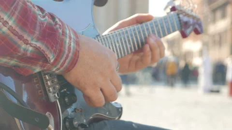 Man playing on guitar Stock Footage 44562757